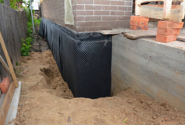 Happy homeowners after waterproofing job in Cleveland